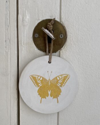 Médaillon - Papillon - Poussière des rues