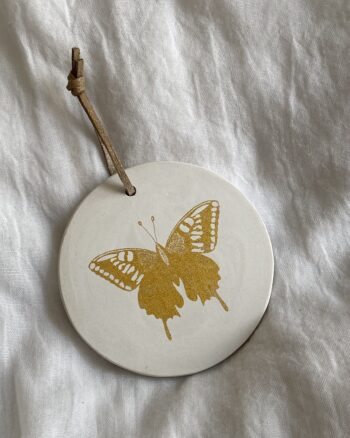 Médaillon - Papillon - Poussière des rues