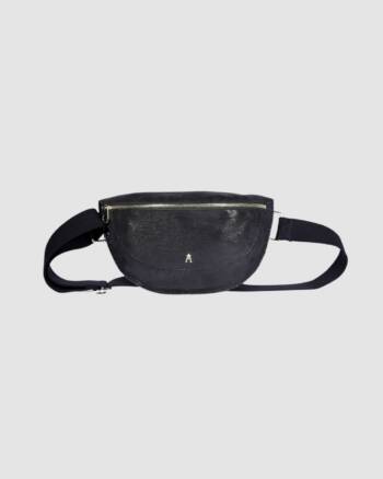 Banane Smile Gotham Craie Studio en cuir d’agneau noir métallisé pailleté, avec sangle réglable.