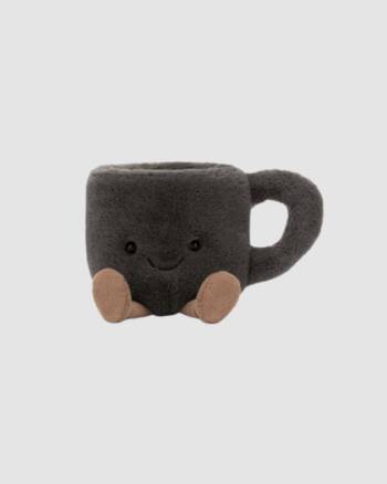 Peluche Jellycat forme tasse à café avec sourire brodé et bottes en velours côtelé