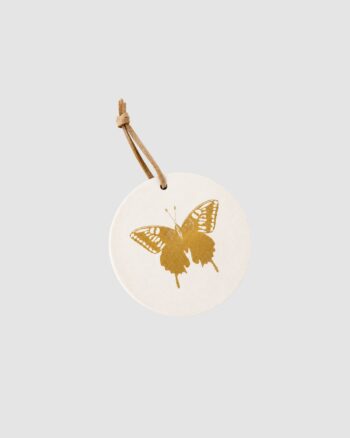 Médaillon Papillon Poussière des Rues en céramique blanche avec motif papillon doré